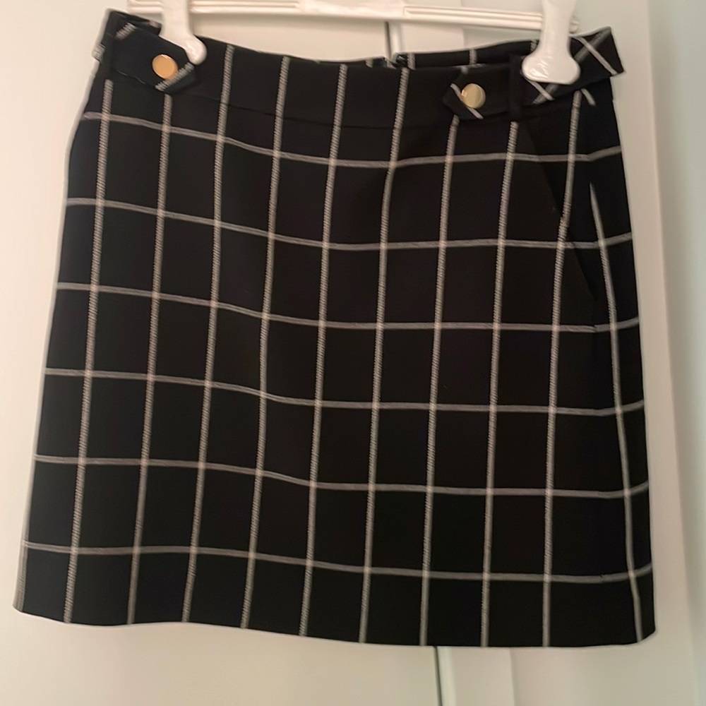 Adorable and professional skirt. Lightly worn.
